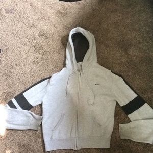 gray and black Nike zip up sweatshirt